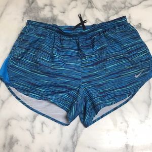 Blue Nike dry fit running shorts